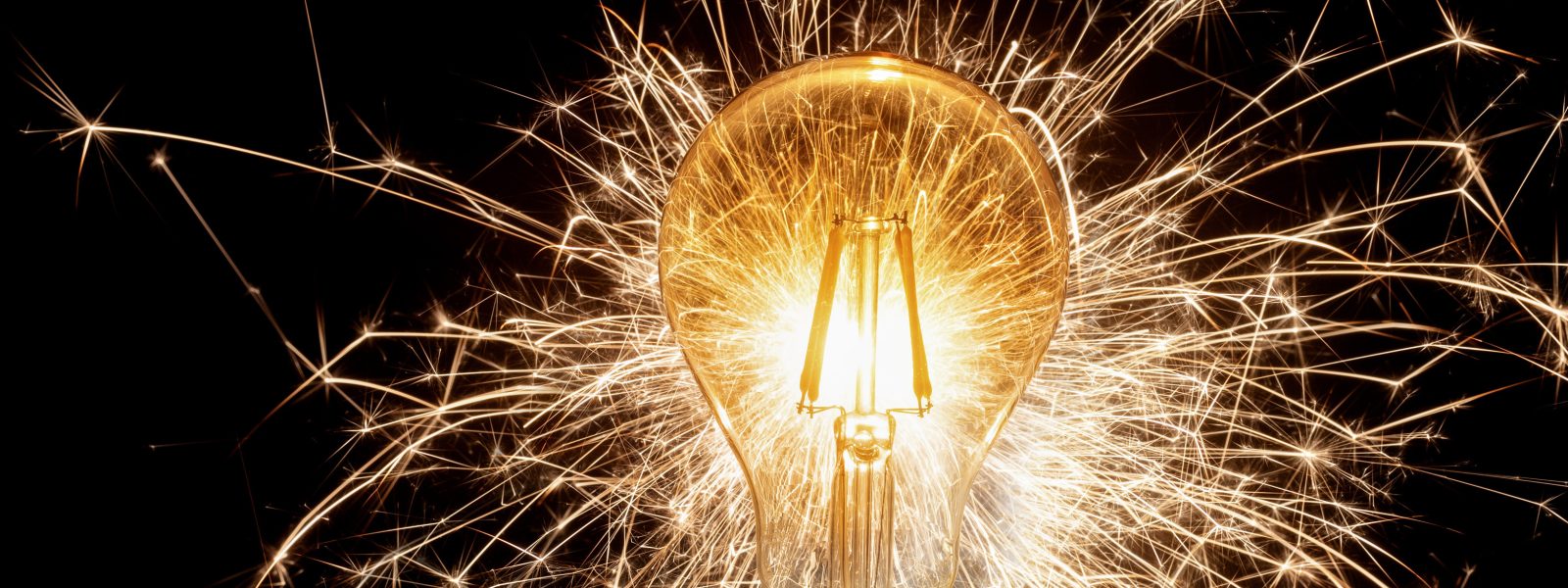 light bulb with bright sparks