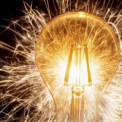 light bulb with bright sparks
