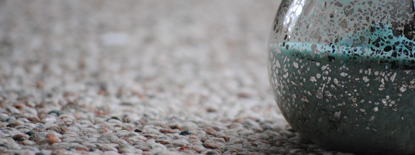 hourglass filled with blue sand