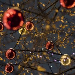 Christmas Baubles against a backdrop of a dark sky