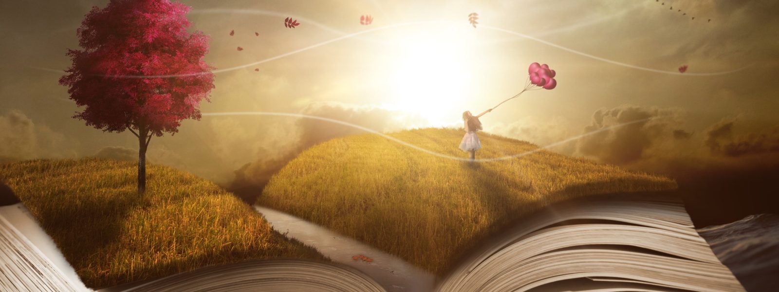 Girl with balloons walking on a landscape made out of an open book