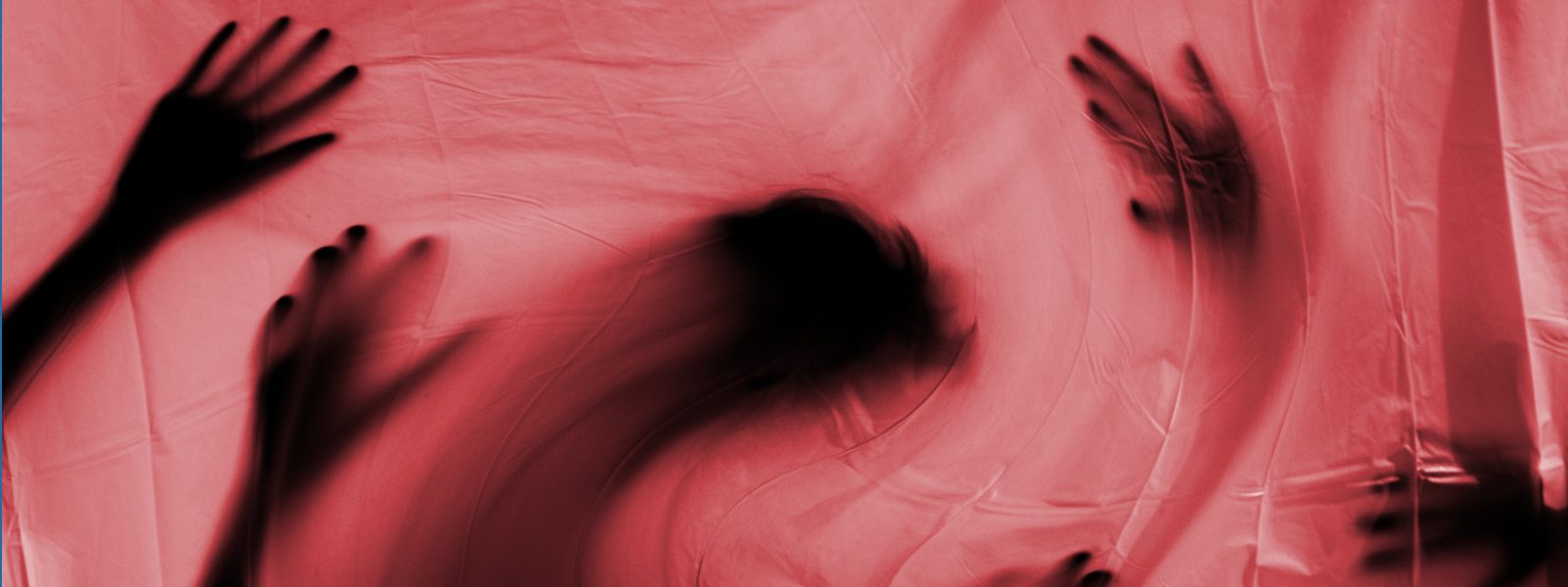 spooky image of warped silhouetted hands