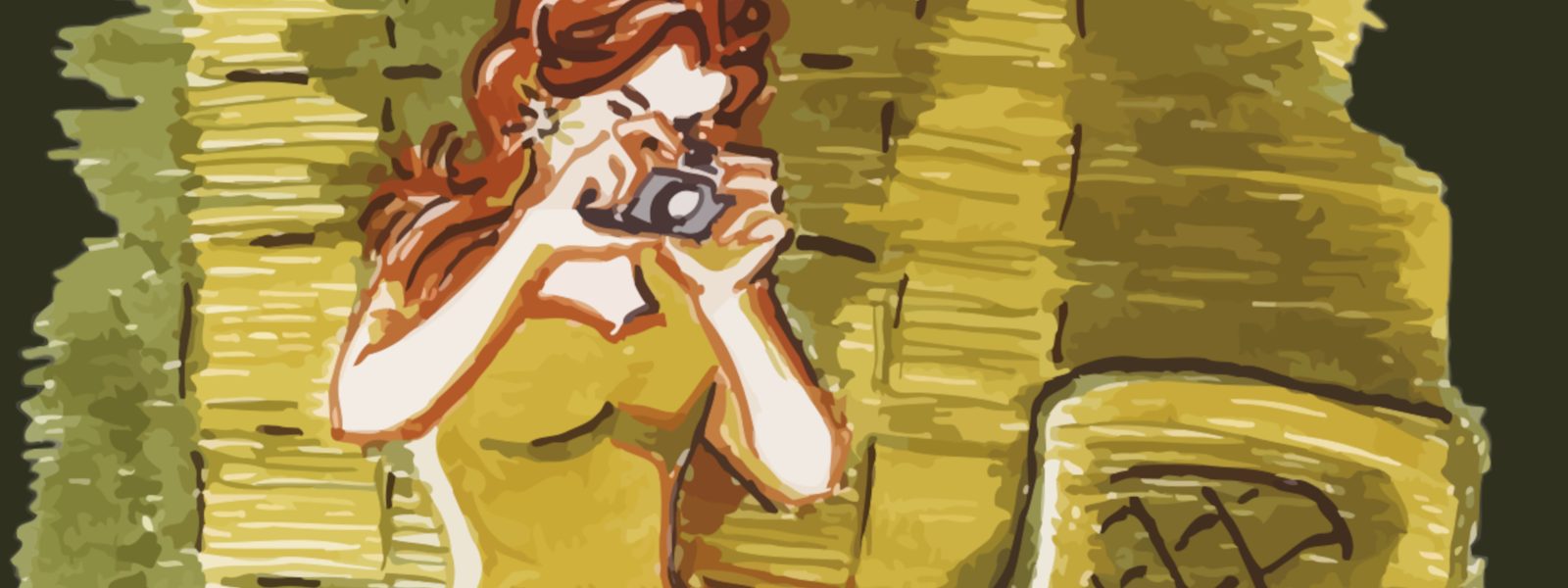 red headed woman with a camera