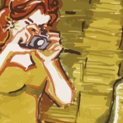 red headed woman with a camera